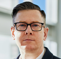 Φωτογραφία του CEO Alexander Hughes από εταιρεία crypto trading